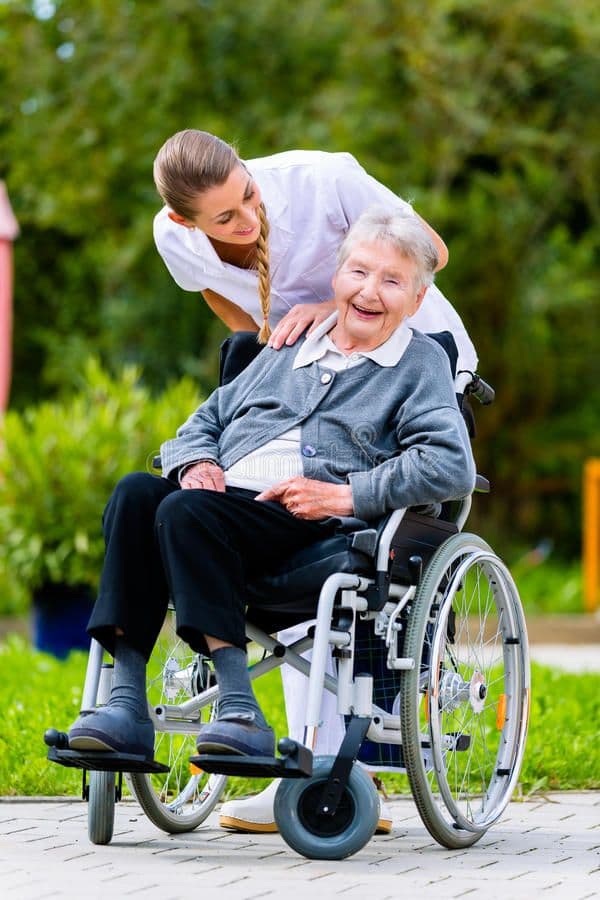 Caregiver helping elderly person